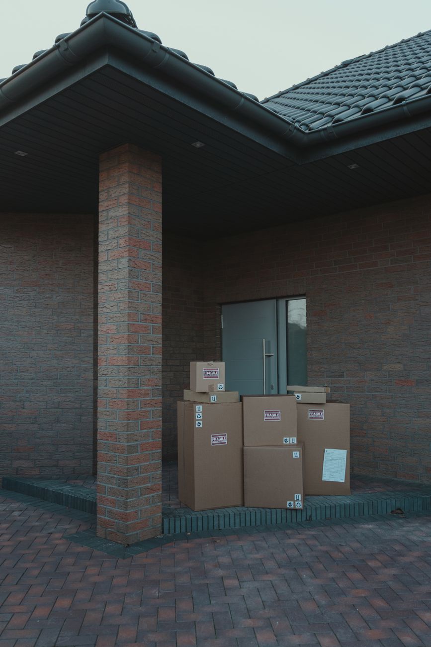brown boxes at the doorway