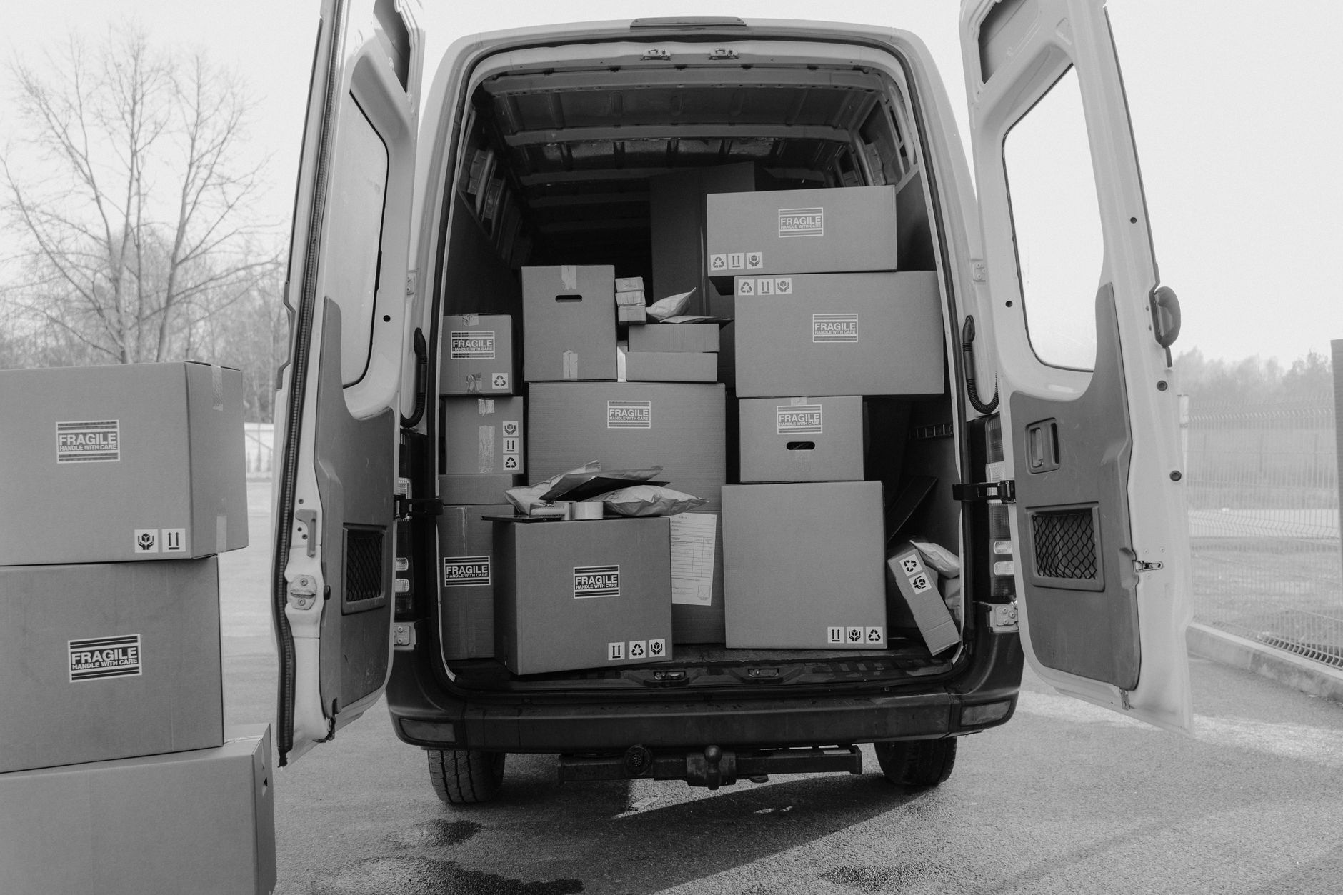 brown cardboard boxes inside the van
